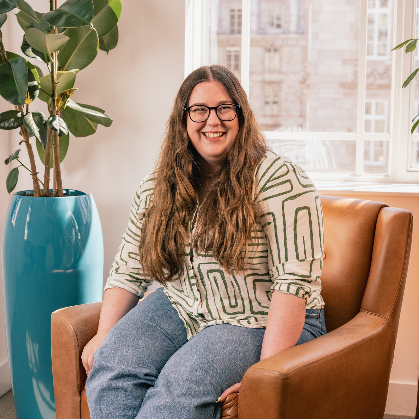 Headshot of Jess Flack, Associate at Erevena