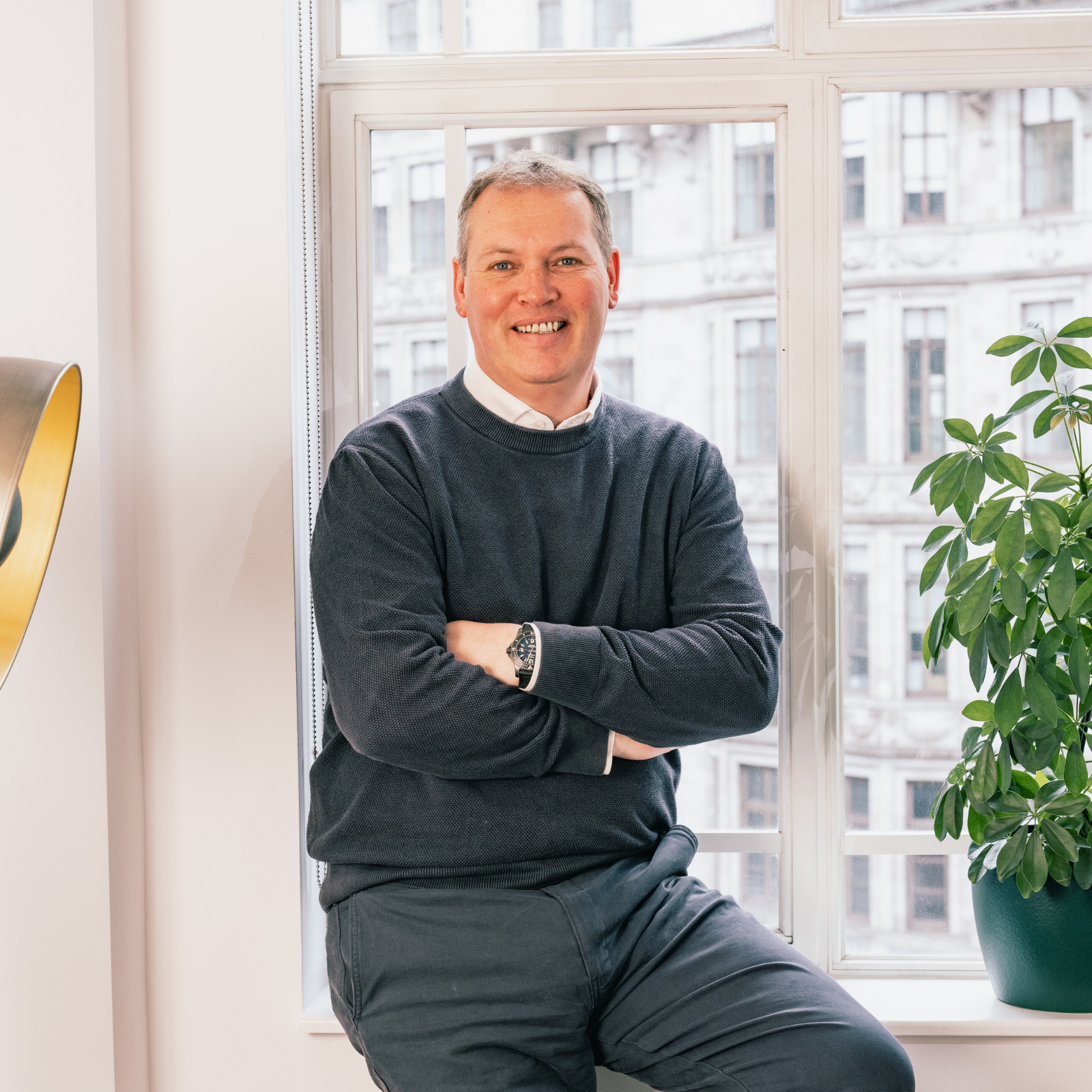 Headshot of John Smith, Partner at Erevena
