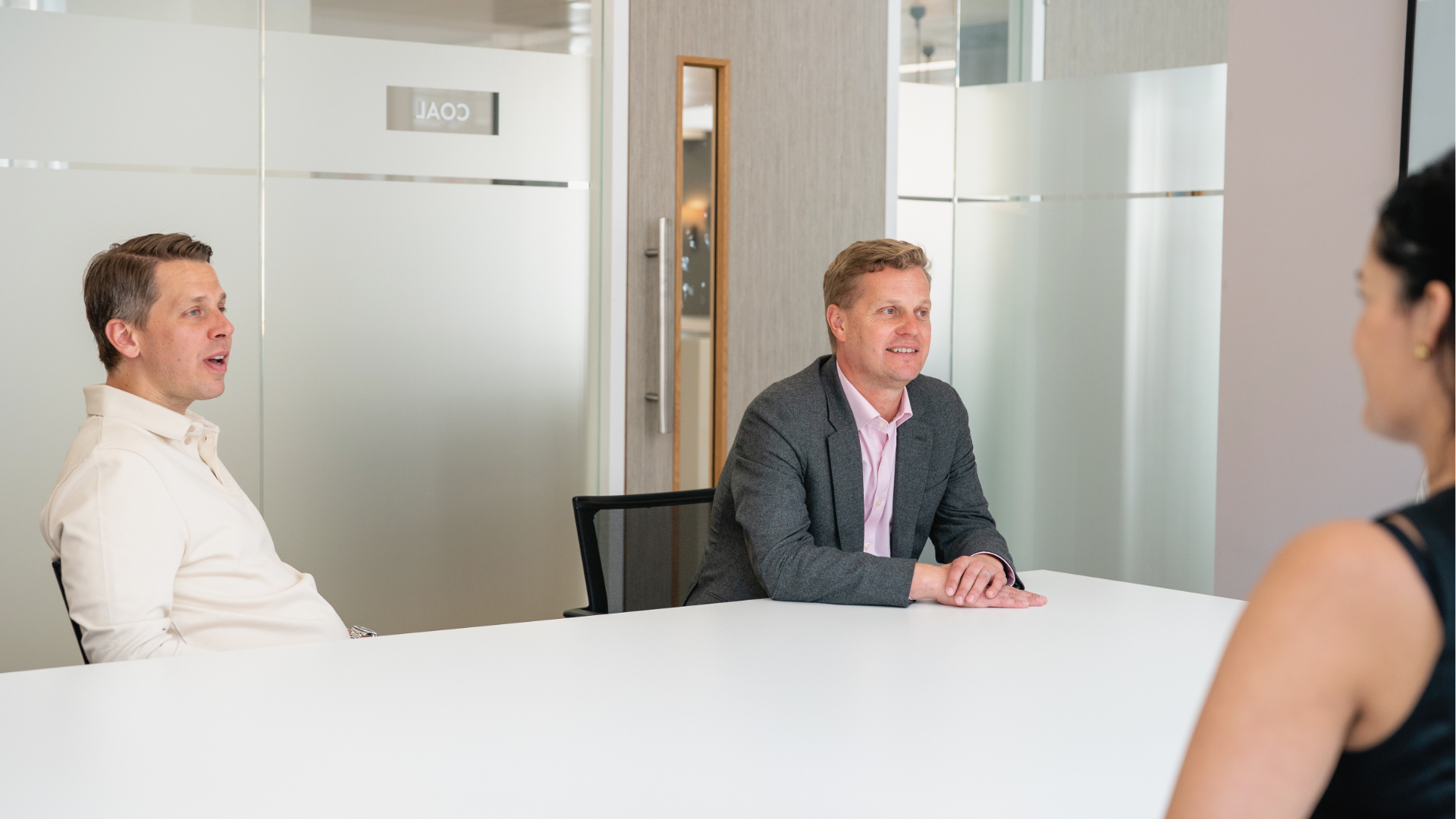Erevena's CEO Jonas Helgesson and Partner Gavin Holland, speaking in a meeting with CMO Danielle Le Toullec